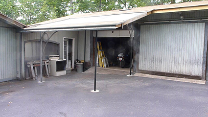Designed, engineered and fabricated carport with removable corner post
